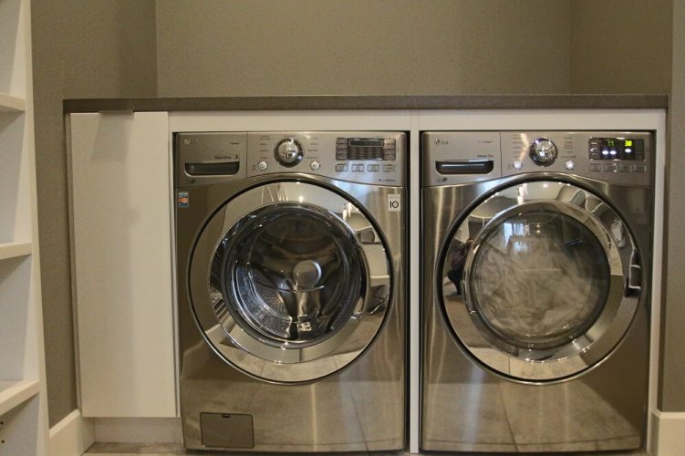 Front loading washer and dryer in stainless steel